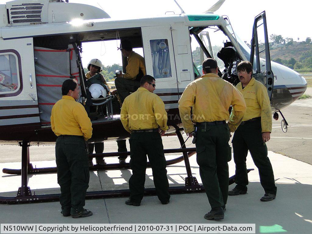 N510WW, 2008 Bell 210 C/N 21003, Fire fighting crew putting on jackets and getting ready to board for flight to Ramona, Ca
