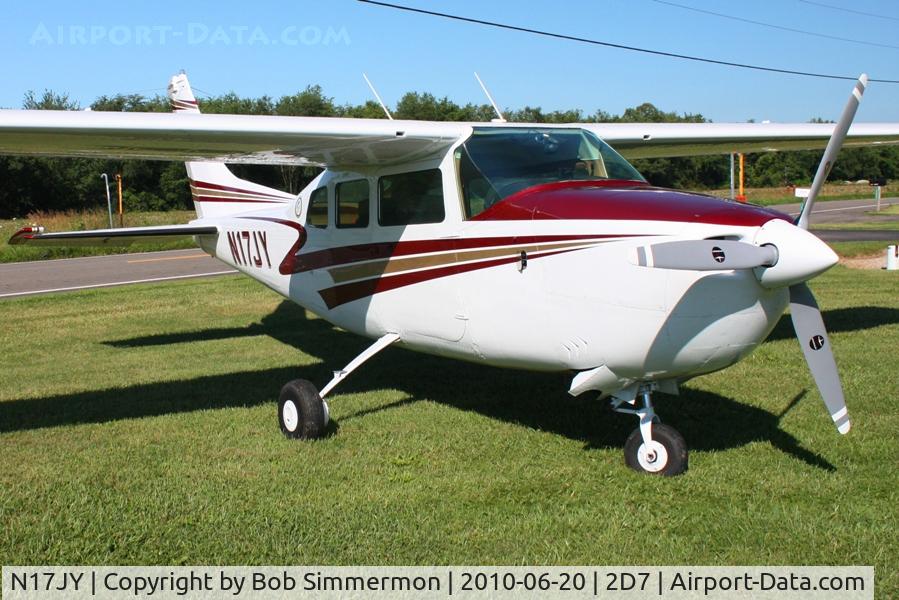 N17JY, 1969 Cessna 210J Centurion C/N 21059154, Parked in the grass at the Father's Day breakfast fly-in, Beach City, Ohio.
