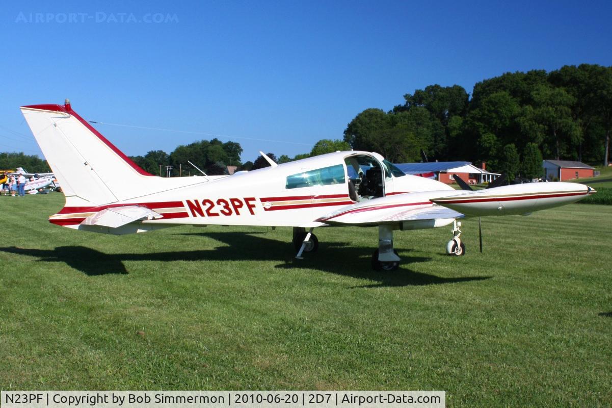 N23PF, 1968 Cessna 310P C/N 310P0044, Parked in the grass at the Father's Day breakfast fly-in, Beach City, Ohio.