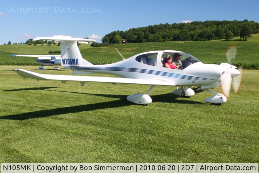 N105MK, 2002 Diamond DA-40 Diamond Star C/N 40.244, Departing the Father's Day breakfast fly-in, Beach City, Ohio.