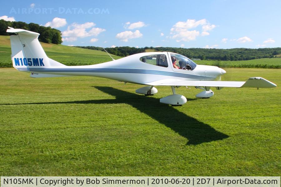 N105MK, 2002 Diamond DA-40 Diamond Star C/N 40.244, Departing the Father's Day breakfast fly-in, Beach City, Ohio.