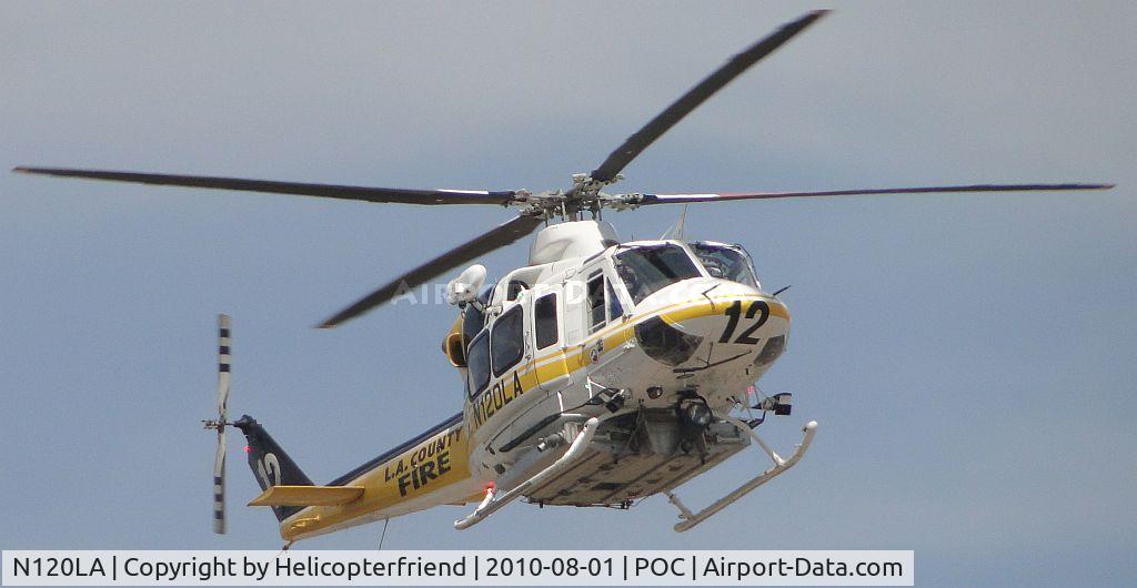 N120LA, 2007 Bell 412EP C/N 36455, Air taxiing between runways 26R and 8L enroute to LACO helipad