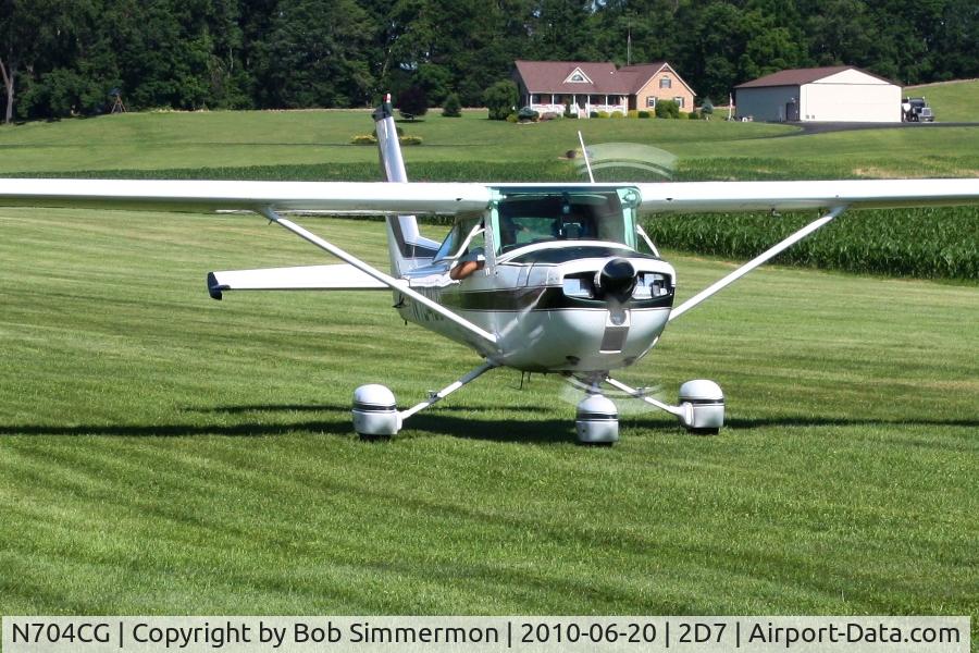 N704CG, 1976 Cessna 150M C/N 15078500, Departing the Father's Day breakfast fly-in, Beach City, Ohio.