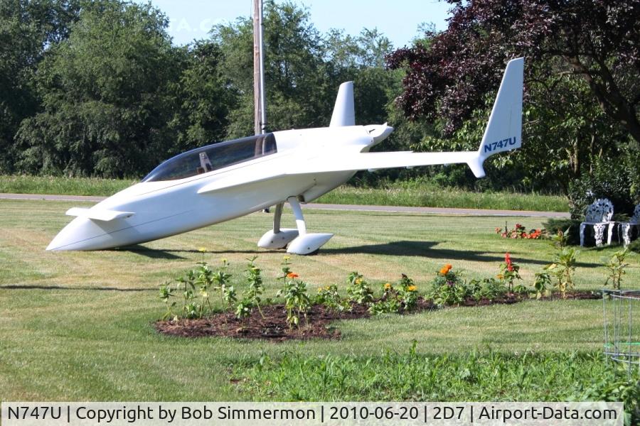 N747U, 1979 Rutan VariEze C/N 632, Parked in the grass at the Father's Day breakfast fly-in, Beach City, Ohio.