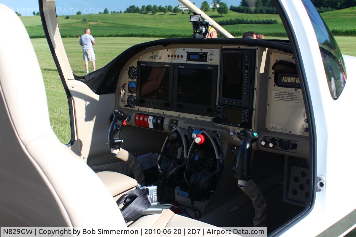 N829GW, Vans RV-10 C/N 40033, Parked in the grass at the Father's Day breakfast fly-in, Beach City, Ohio.