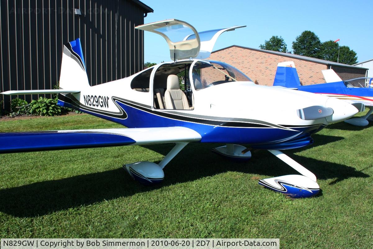N829GW, Vans RV-10 C/N 40033, Parked in the grass at the Father's Day breakfast fly-in, Beach City, Ohio.