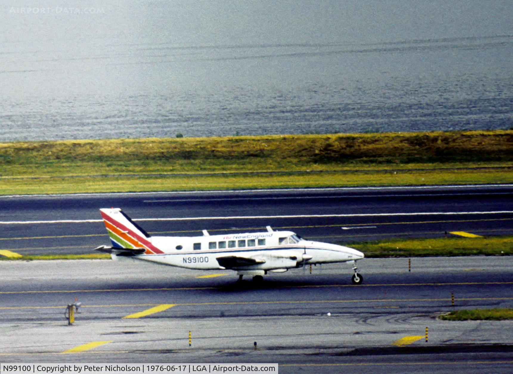 N99100, 1969 Beech 99 C/N U-100, Beech 99 of Air New England taxying to the terminal at La Guardia in the Summer of 1976.