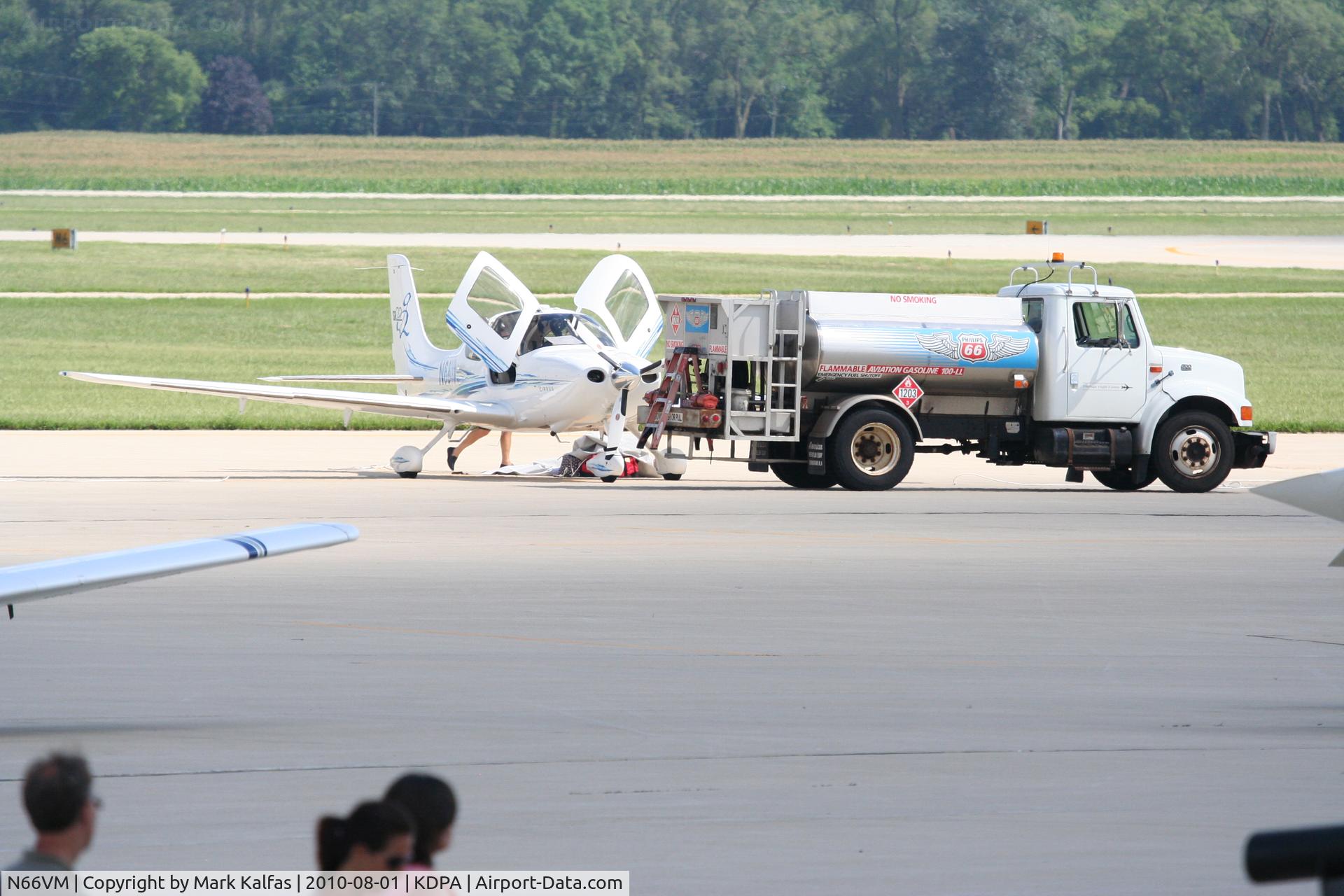 N66VM, 2005 Cirrus SR22 C/N 1556, VM EQUIPMENT COMPANY Cirrus Design Corp SR22, N66VM gassing up on the ramp KDPA for a trip up to KUES.