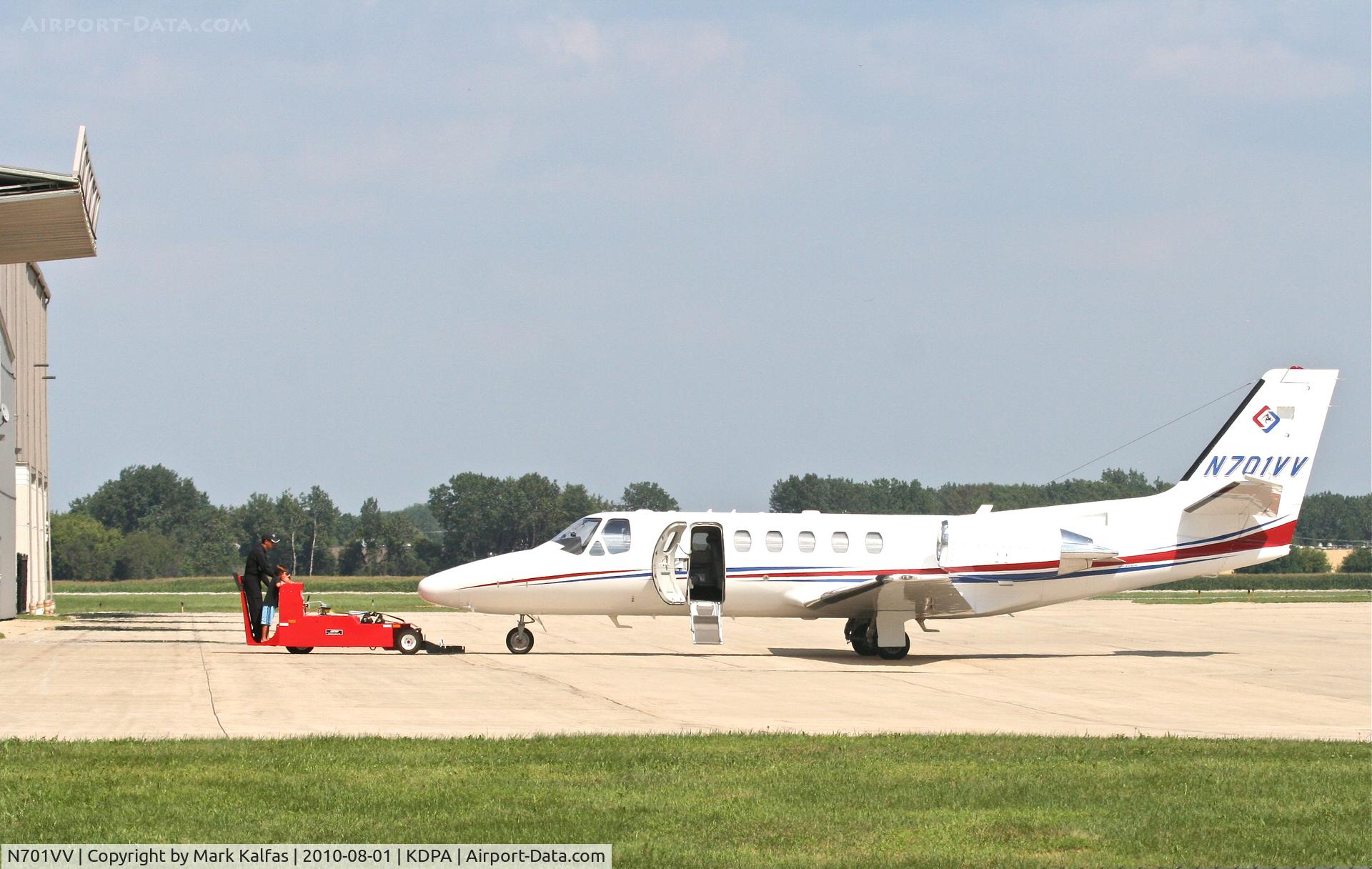 N701VV, 2002 Cessna 550 Citation Bravo C/N 550-1033, TFH AVIATION LLC Cessna 550 Citation Bravo, N701VV getting a tow into the hangar KDPA.
