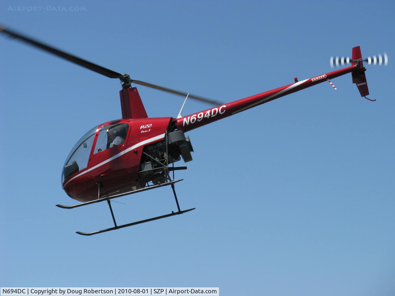 N694DC, 2004 Robinson R22 Beta C/N 3573, 2004 Robinson R22 BETA II, Lycoming O-360 derated to 131 Hp, takeoff climb and low level departure