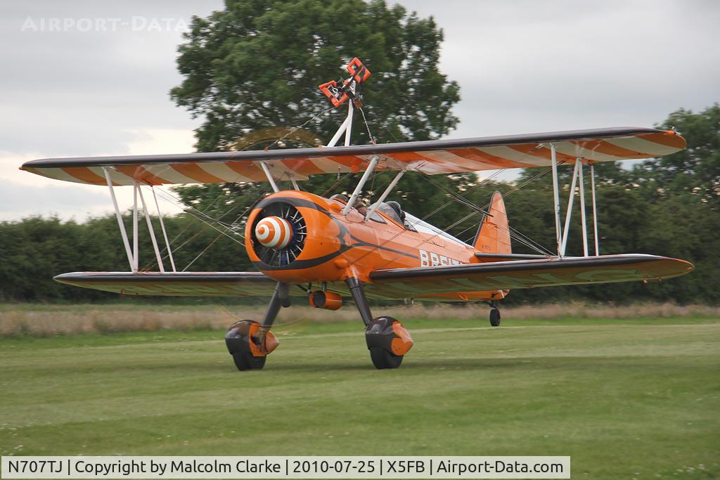 N707TJ, 1943 Boeing A75N1(PT17) C/N 75-950, Taking off from Fishburn Airfield for a wing walking performance together with N74189 at the 2010 Sunderland Air Show. Sponsored by The Breitling Watch Co for 2010.