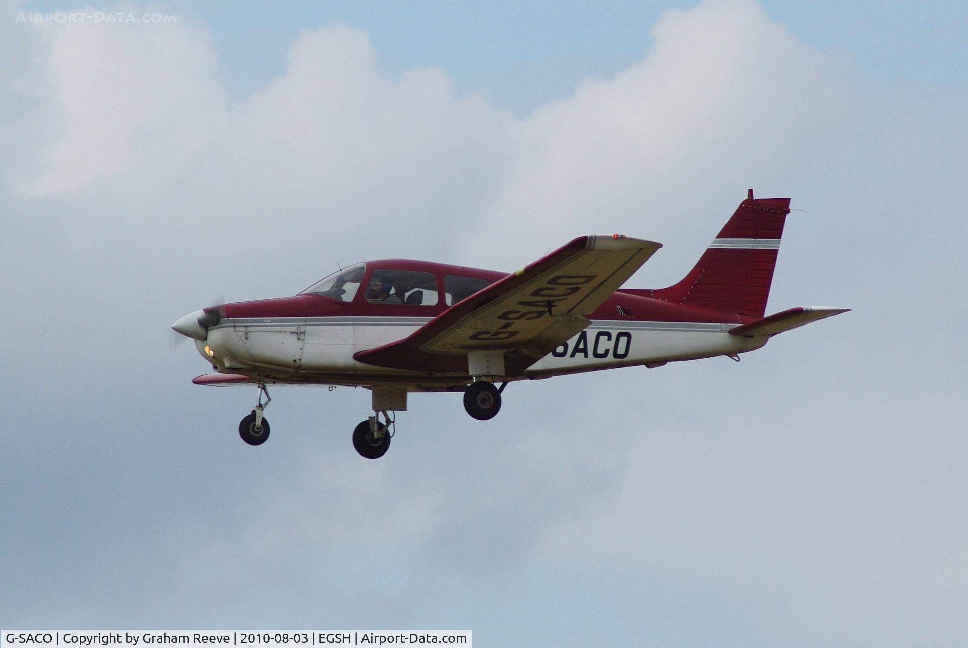 G-SACO, 1984 Piper PA-28-161 Cherokee Warrior II C/N 28-8416085, Landing at Norwich.
