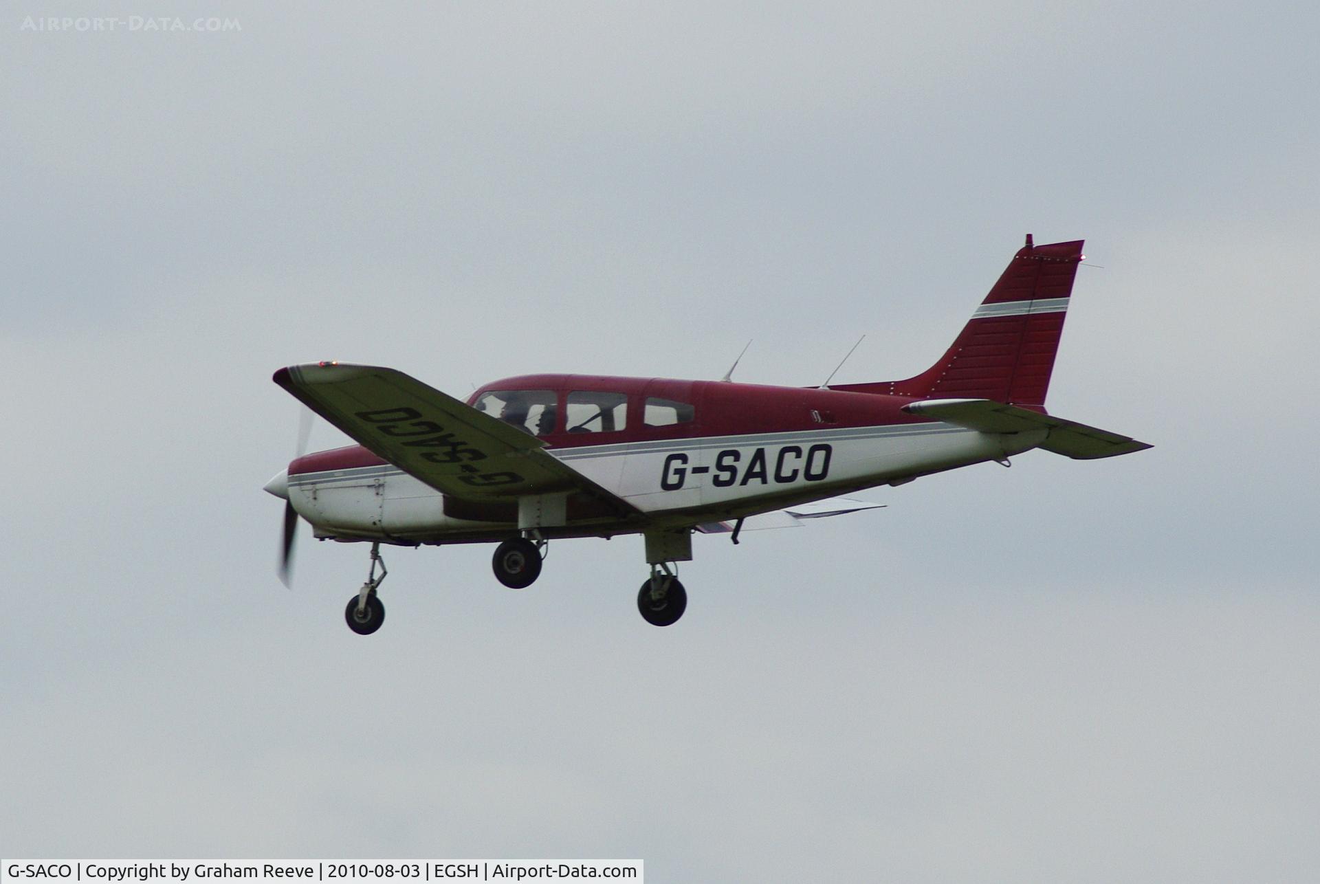 G-SACO, 1984 Piper PA-28-161 Cherokee Warrior II C/N 28-8416085, About to touch down at Norwich.