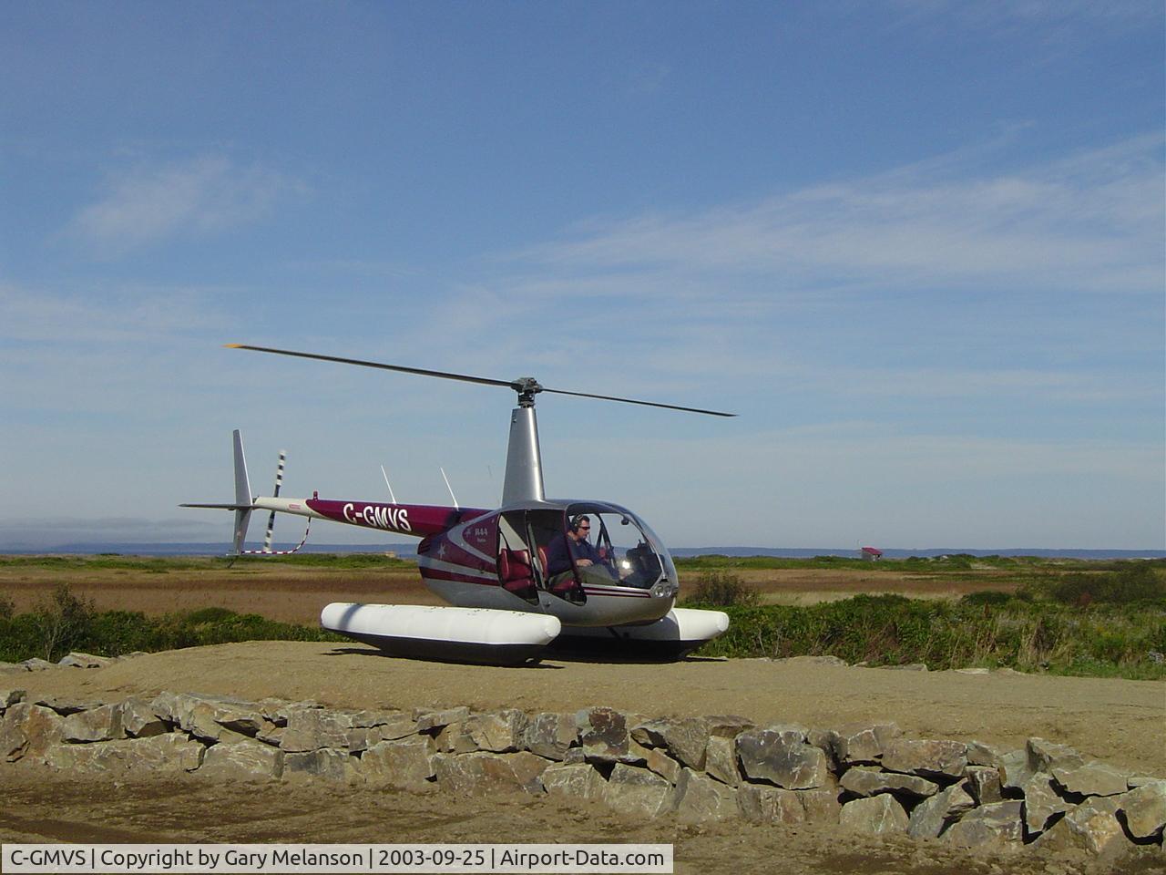 C-GMVS, 1995 Robinson R44 C/N 0192, on the pad in saulnierville nova scotia september 2003