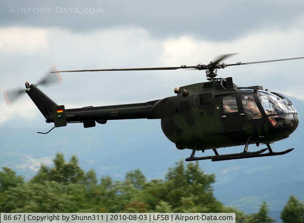 86 67, MBB Bo.105M C/N 6067, Landing rwy 15... for refuelling...