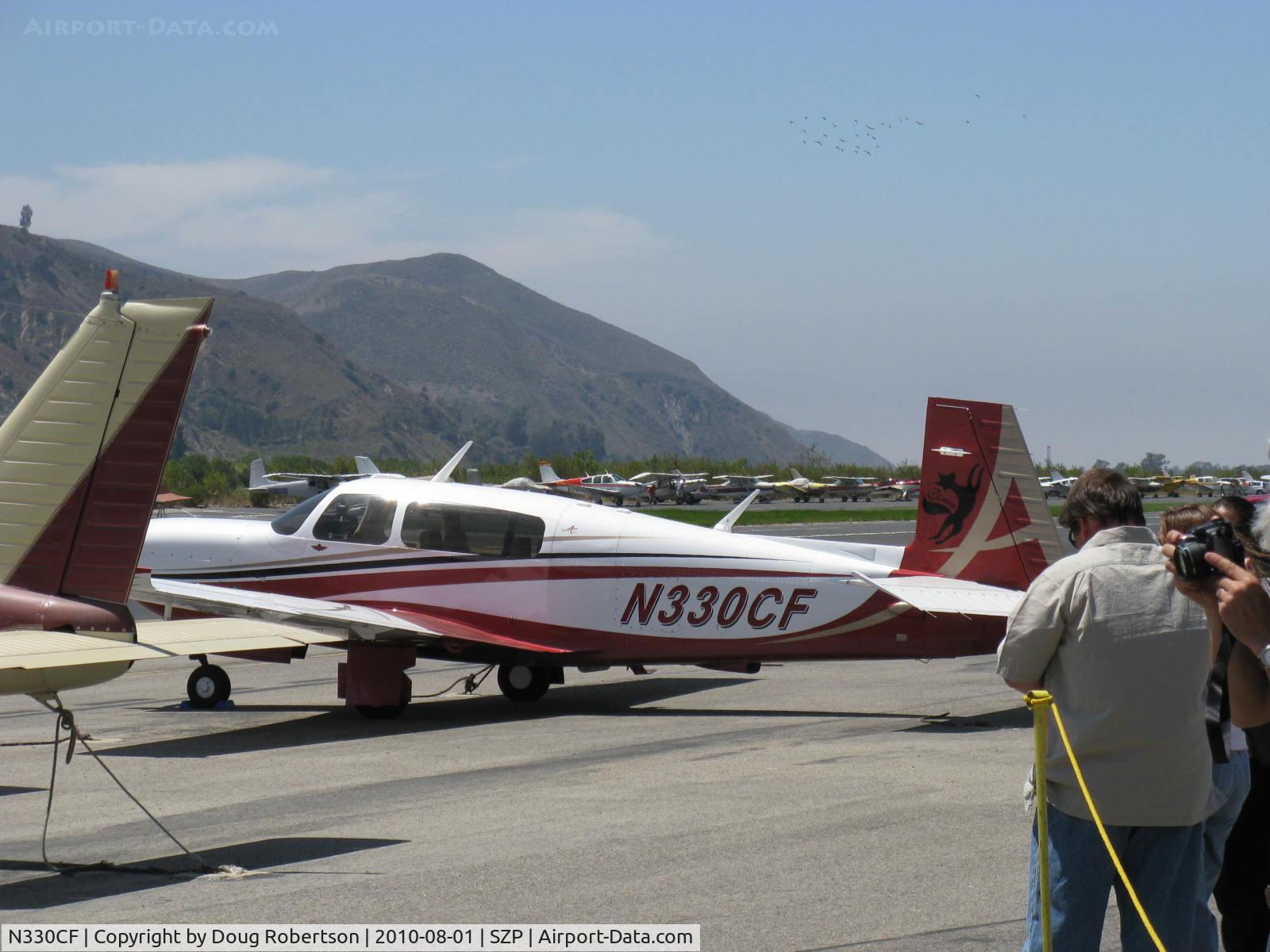 N330CF, 2007 Mooney M20TN Acclaim C/N 31-0067, 2007 Mooney M20TN ACCLAIM, Continental TSIO-550-G 280 Hp, attracting a crowd