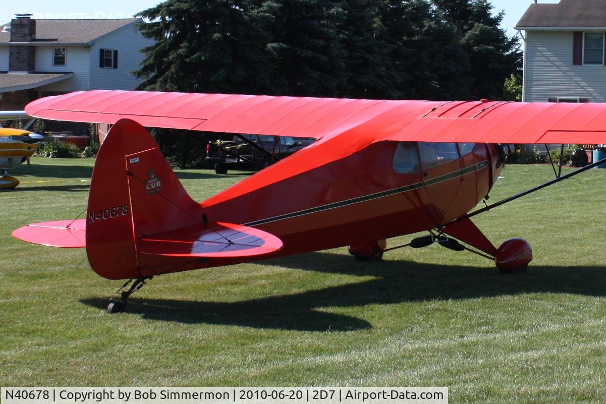 N40678, 1941 Piper J5A Cub Cruiser C/N 5-1116, Arriving at Beach City, Ohio during the Father's Day fly-in.