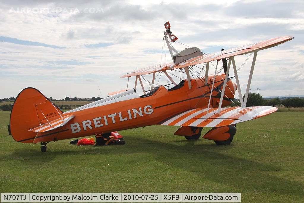 N707TJ, 1943 Boeing A75N1(PT17) C/N 75-950, Boeing PT-17 Kaydet showing the clamp-on transit fuel tank attached to the upper wing. At Fishburn Airfield prior to a wing walking performance at the Sunderland Air Show.