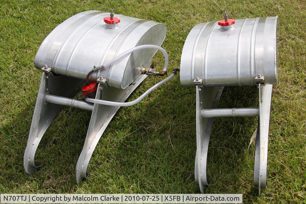 N707TJ, 1943 Boeing A75N1(PT17) C/N 75-950, A close-up of the the clamp-on transit fuel tanks used by Boeing PT-17 Kaydets N707TJ and N74189 for the longer distance journeys to wing walking venues. Seen here at Fishburn Airfield in July 2010.