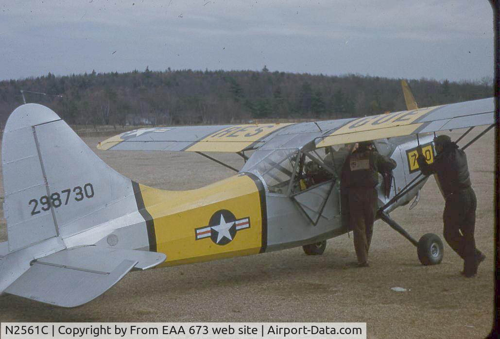 N2561C, Stinson L-5E Sentinel C/N 4472, Taken while aircraft was still in service with USAF. Assume the late 40's. Note the pilot standing at the door with a CBI 