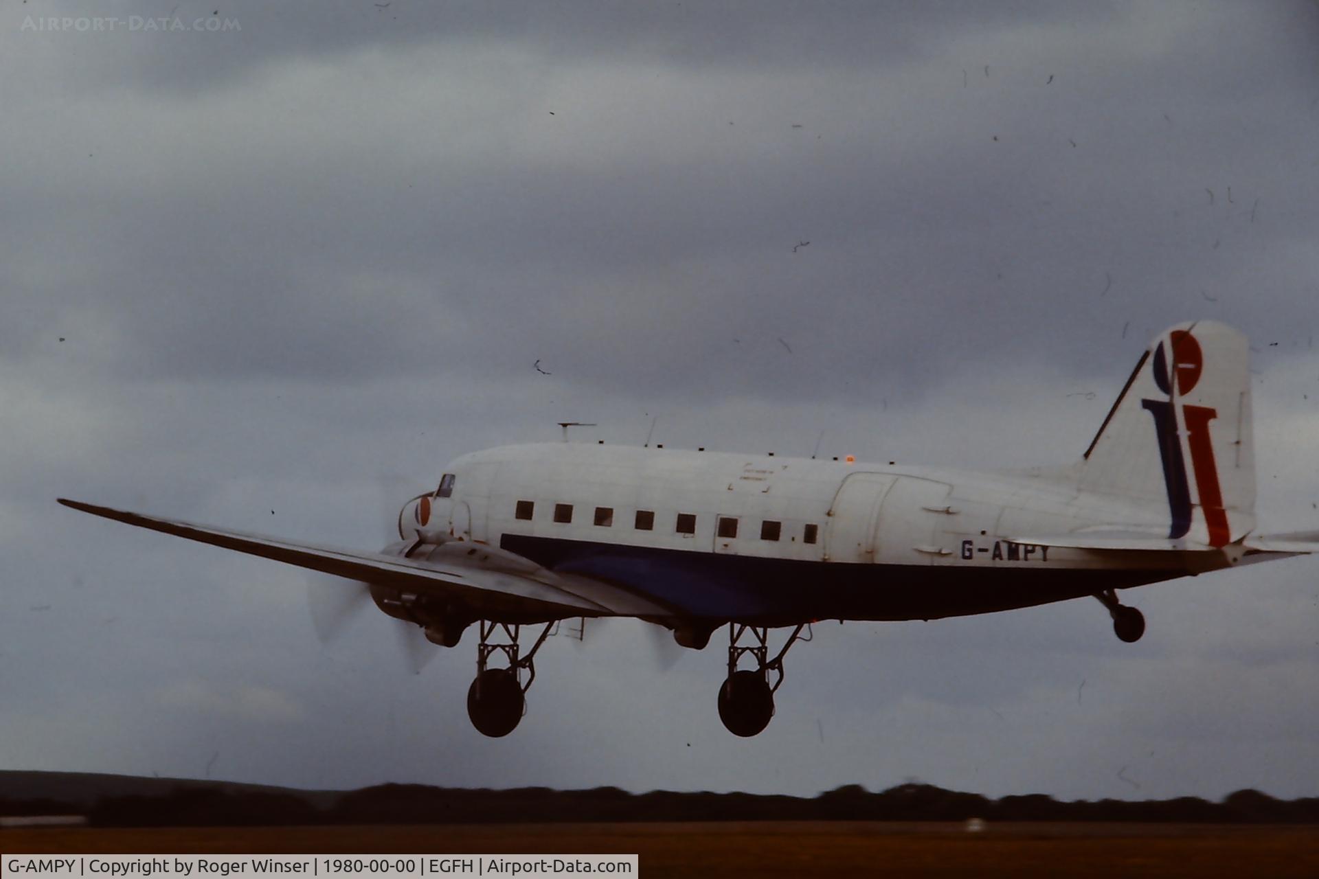 G-AMPY, 1944 Douglas C-47B-15-DK Dakota 4 C/N 26569, Intra Airways Douglas Dakota departing Runway 22 in the late 1970's.