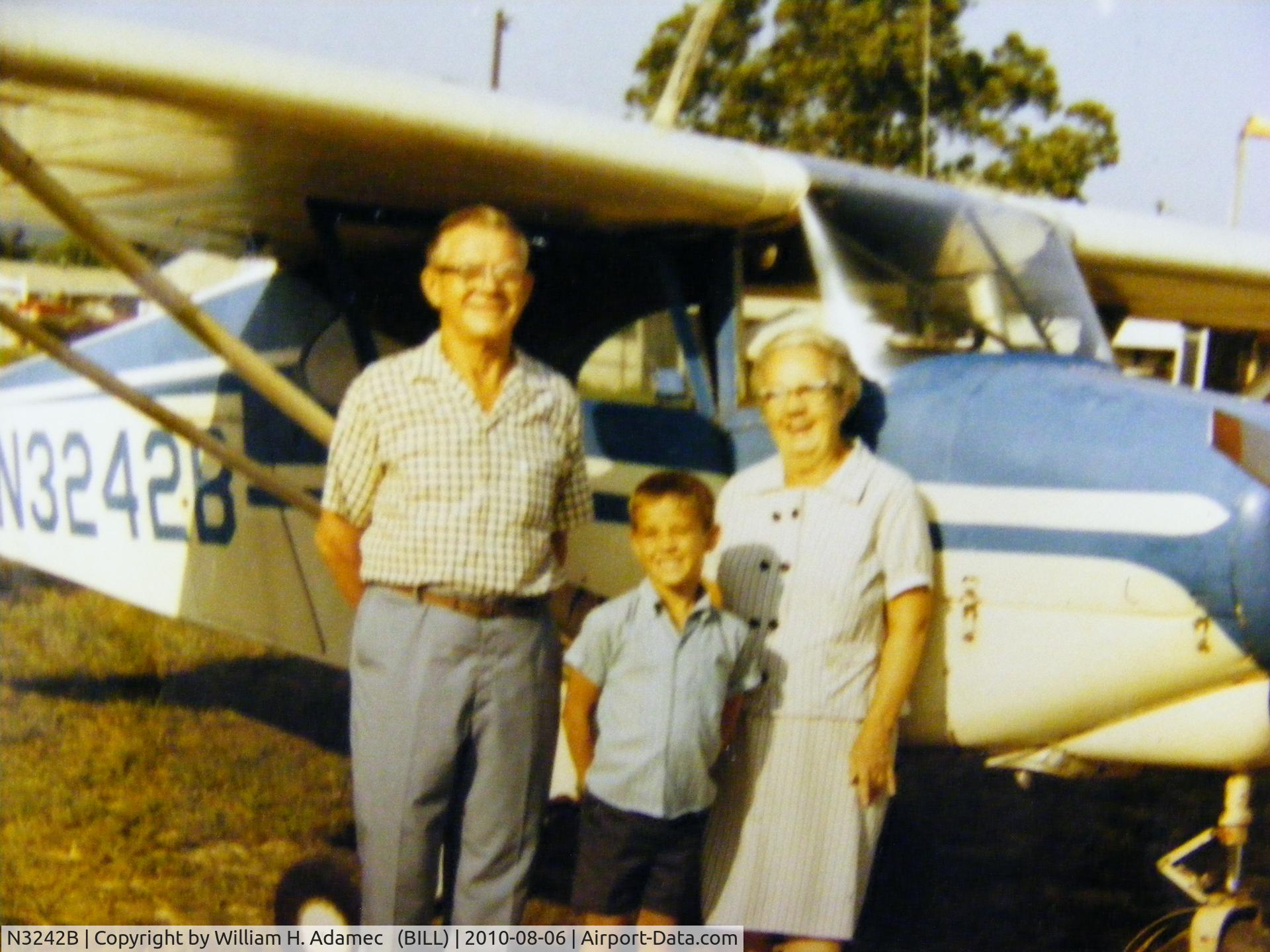 N3242B, 1954 Piper PA-22-135 Tri-Pacer C/N 22-2072, Picture is from Skylane Airport, Evansville, IN. Dated 1968 on cross country trip from Doylstown, Pa. Mother-in-law, Son & Father-in-law. Still have good memorys from N3242B