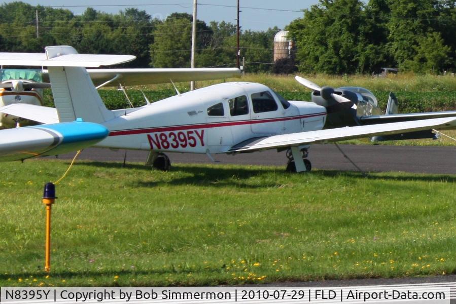 N8395Y, 1981 Piper PA-28RT-201 Arrow IV C/N 28R-8118072, Parked on the taxiway at Fond Du Lac, Wisconsin during Oshkosh 2010.
