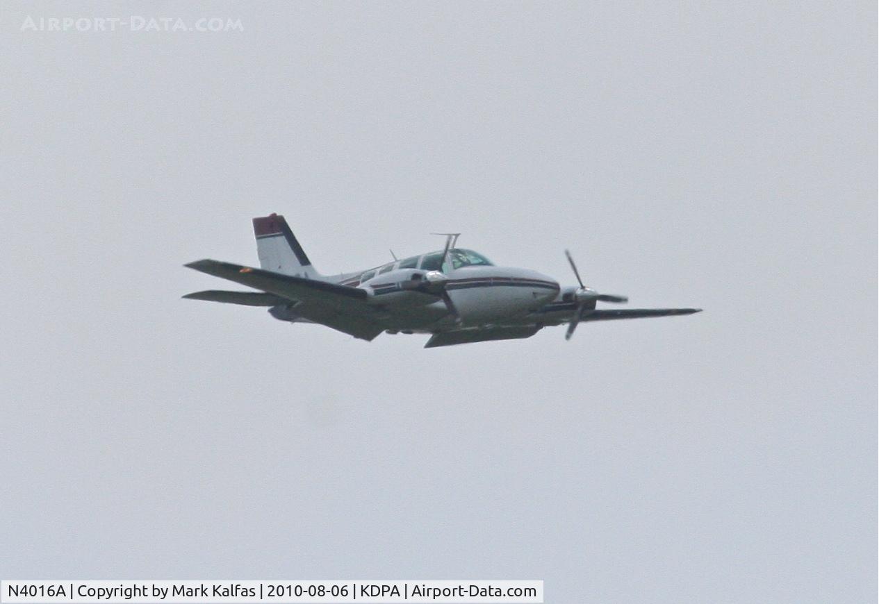 N4016A, 1970 Beech 58 Baron C/N TH-9, BEMIDJI AVIATION SERVICES INC Beech 58, N4016A conducting some low altitude maneuvers 2 miles SE of KDPA.