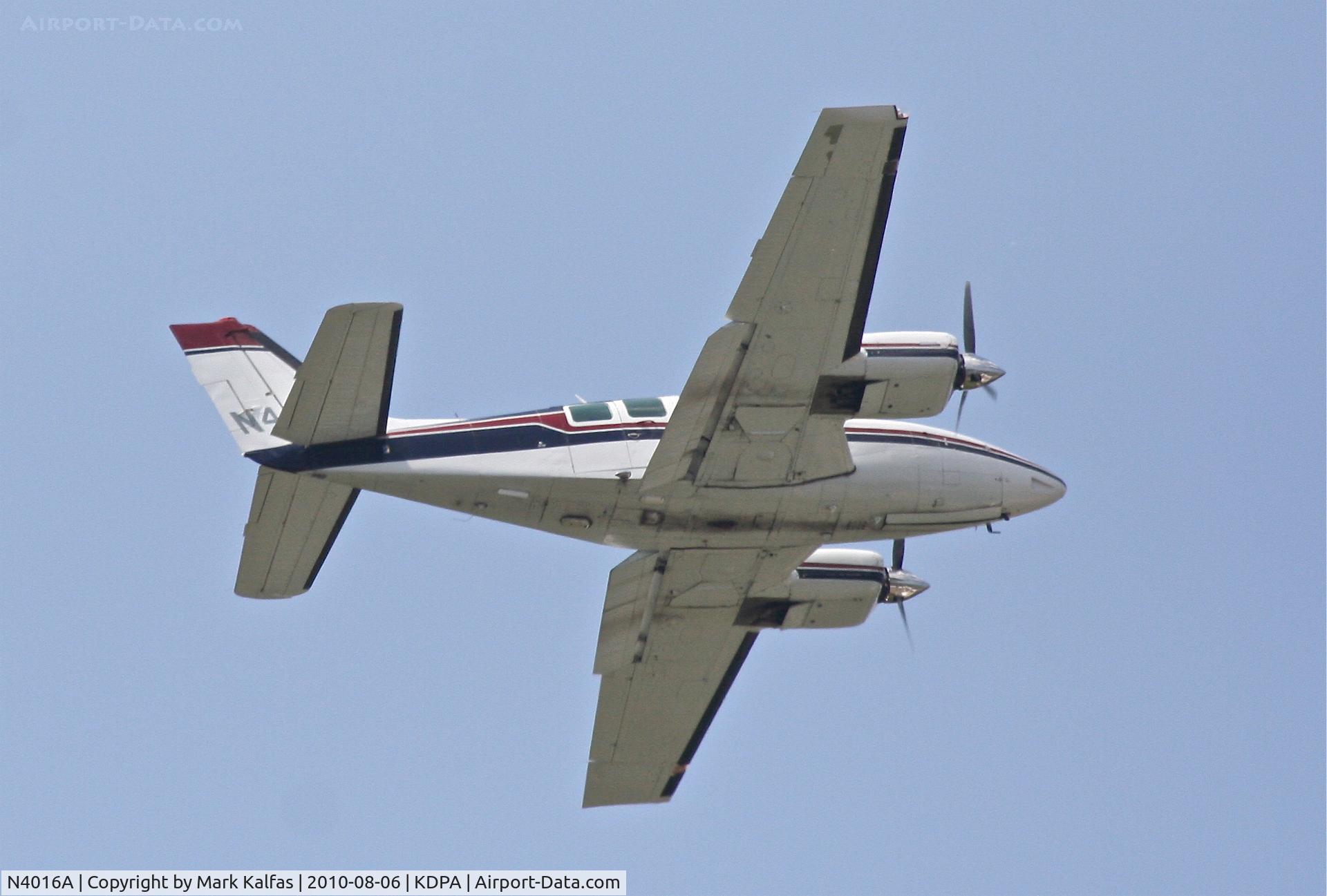 N4016A, 1970 Beech 58 Baron C/N TH-9, BEMIDJI AVIATION SERVICES INC Beech 58, N4016A conducting some low altitude maneuvers 2 miles SE of KDPA.