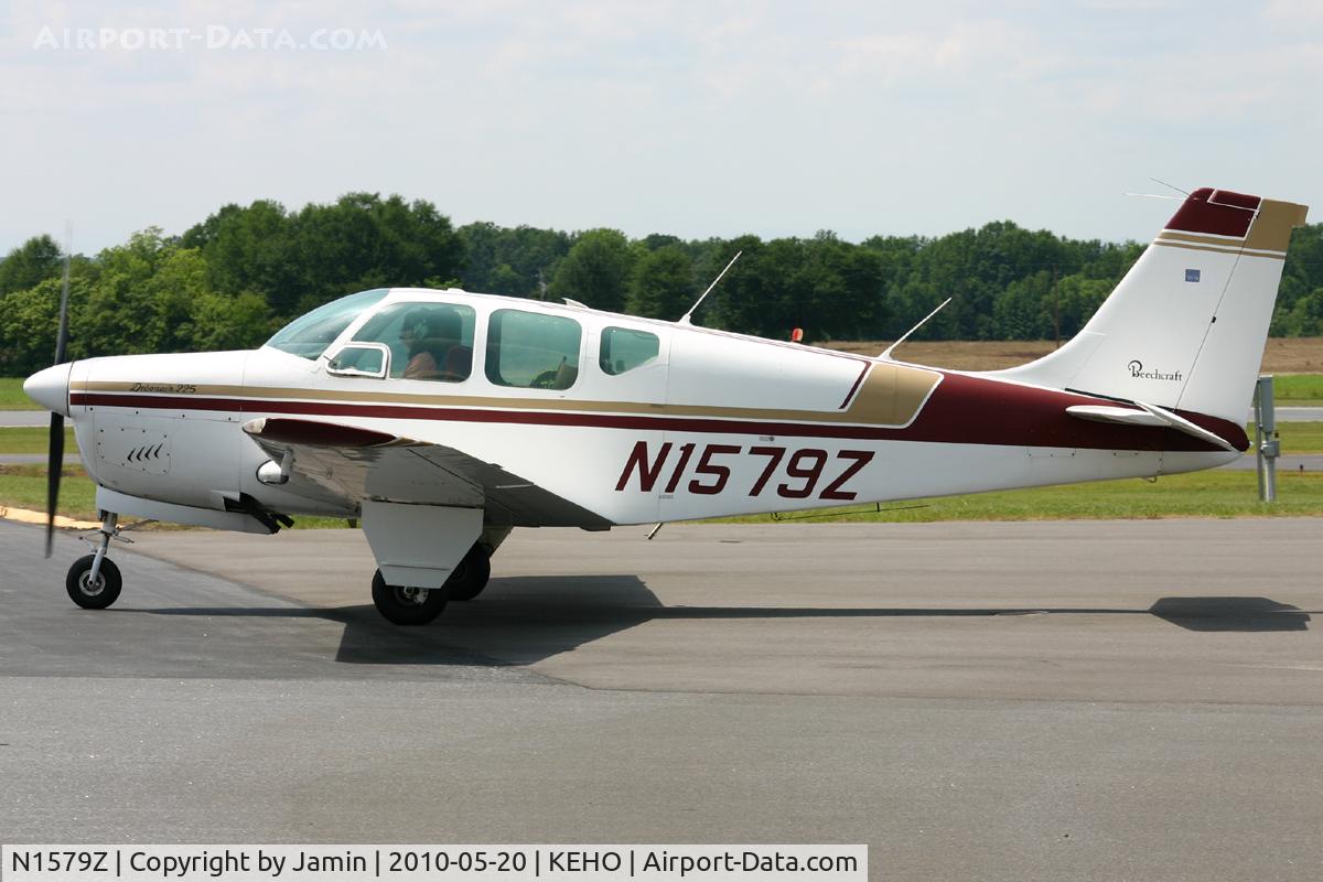 N1579Z, 1961 Beech 35-B33 Debonair C/N CD-434, Departing the pumps.