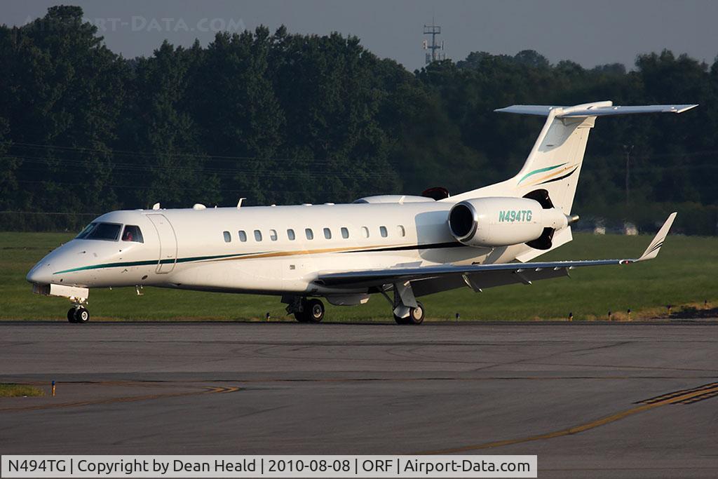 N494TG, 2004 Embraer EMB-135BJ Legacy C/N 145678, Admiralty Air LLC's 2004 Embraer EMB-135BJ Legacy N494TG with thrust reversers deployed as it slows down on RWY 5 after arrival from Barnstable Municipal Airport (KHYA) - Hyannis, MA.