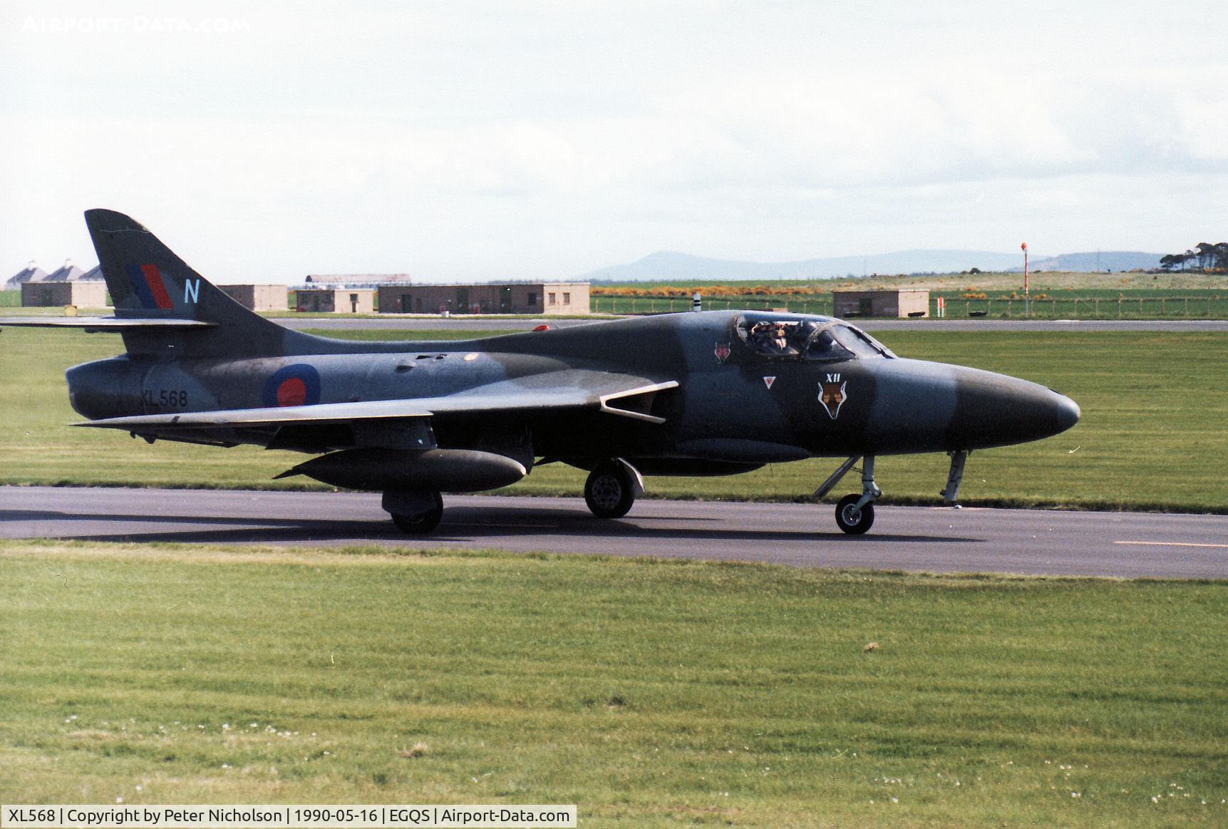 XL568, 1958 Hawker Hunter T.7A C/N 41H-693719, Hunter T.7A of 12 Squadron taxying to the active runway at RAF Lossiemouth in May 1990.