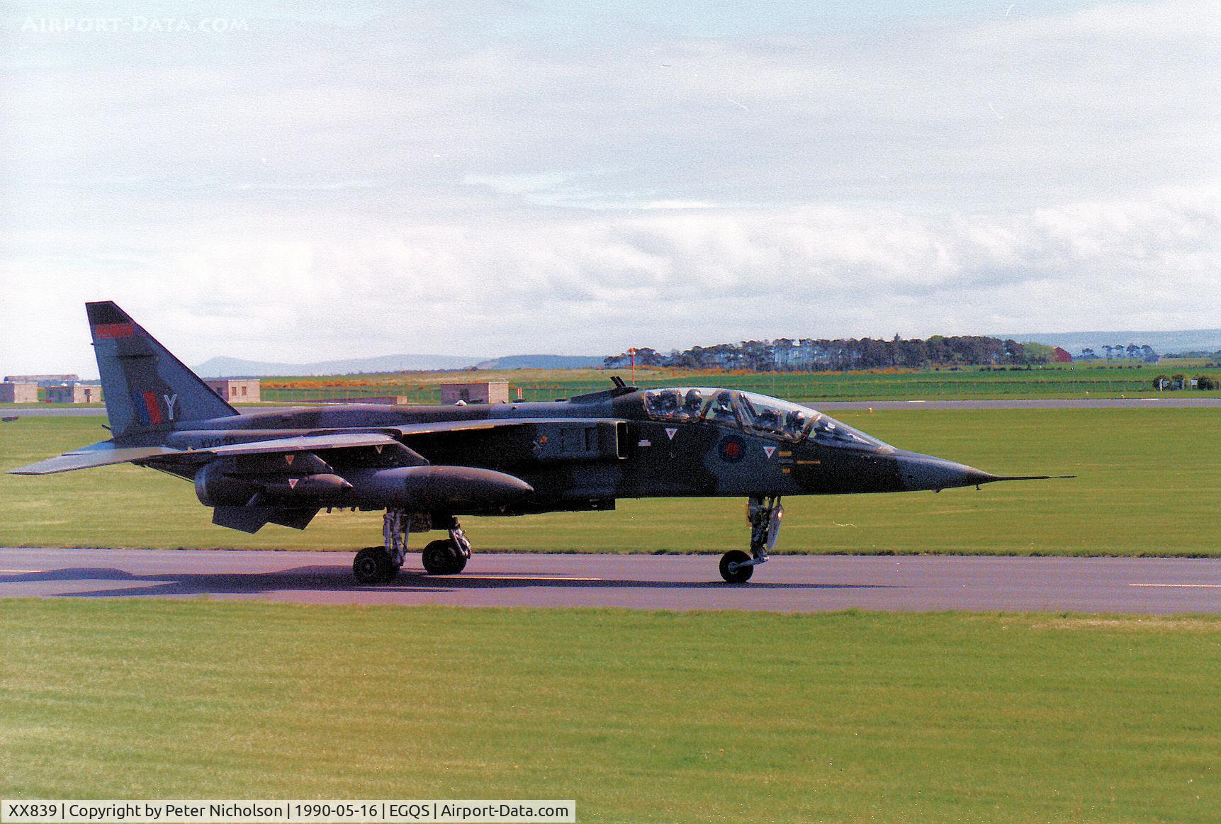 XX839, 1975 Sepecat Jaguar T.2A C/N B.27, Jaguar T.2A of 226 Operational Conversion Unit awaiting clearance to join the active runway at RAF Lossiemouth in May 1990.