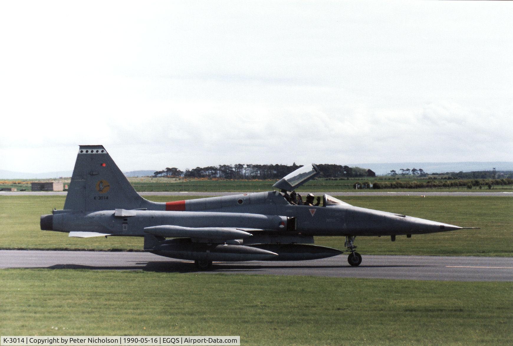 K-3014, 1970 Canadair NF-5A Freedom Fighter C/N 3014, A friendly wave from the pilot of this 314 Squadron NF-5A as he waited for clearance to join the active runway at RAF Lossiemouth in May 1990.