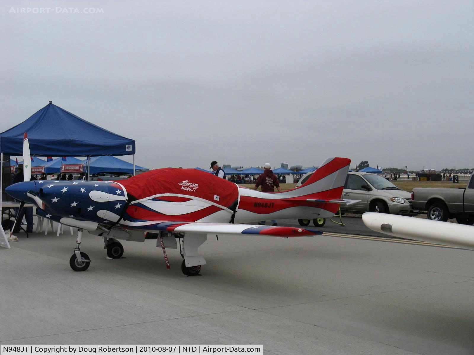 N948JT, 2000 Lancair 360 C/N 001 (N948GT), 2000 Thompson LANCAIR T360, Lycoming IO-360 with flamboyant patriotic paint finish.