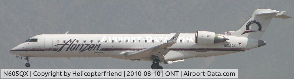 N605QX, 2002 Bombardier CRJ-701 (CL-600-2C10) Regional Jet C/N 10022, On final to runway 26R