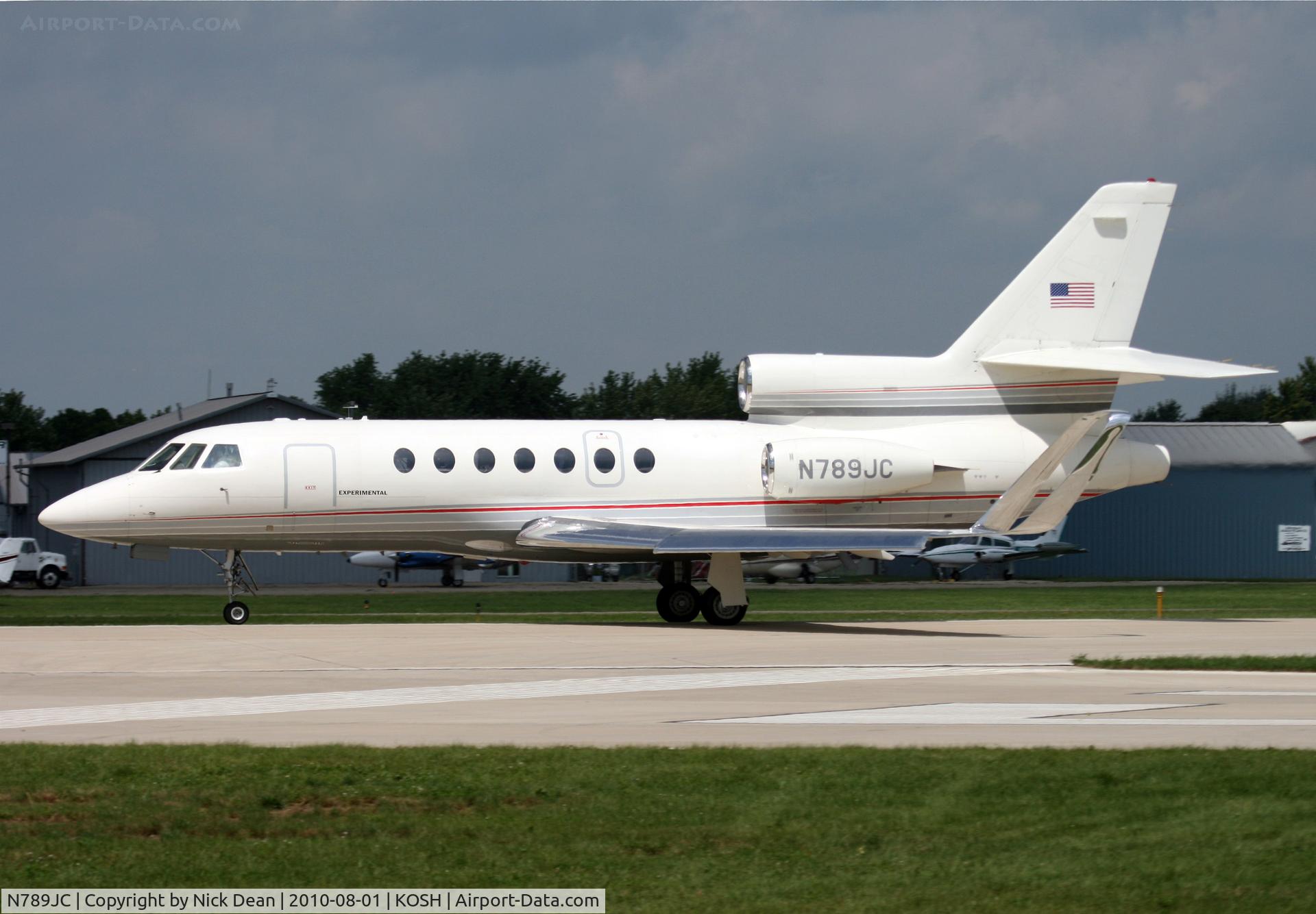 N789JC, 1982 Dassault Falcon 50 C/N 66, KOSH Hideous spiroid winglets they are apparently very efficient but cant imagine anyone ruining the look of their Falcon with these ugly things!