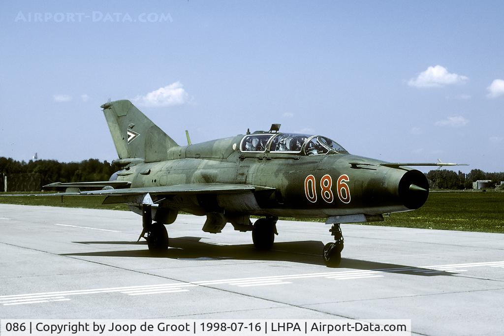 086, Mikoyan-Gurevich MiG-21UM C/N 516955086, During flying days holding point was a good place to take pictures. Papa was modernized afterwards and is now home of the NATO C-17s.