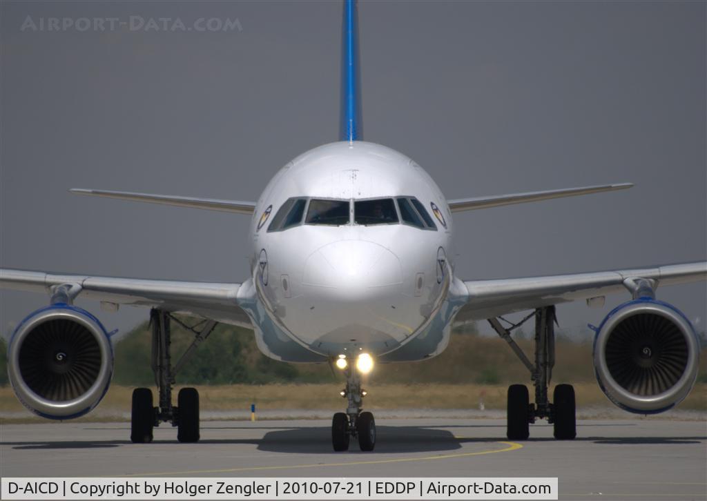 D-AICD, 1998 Airbus A320-212 C/N 0884, Suddenly an aircraft with sunglasses on its face looked at me from the other side of the fence.......