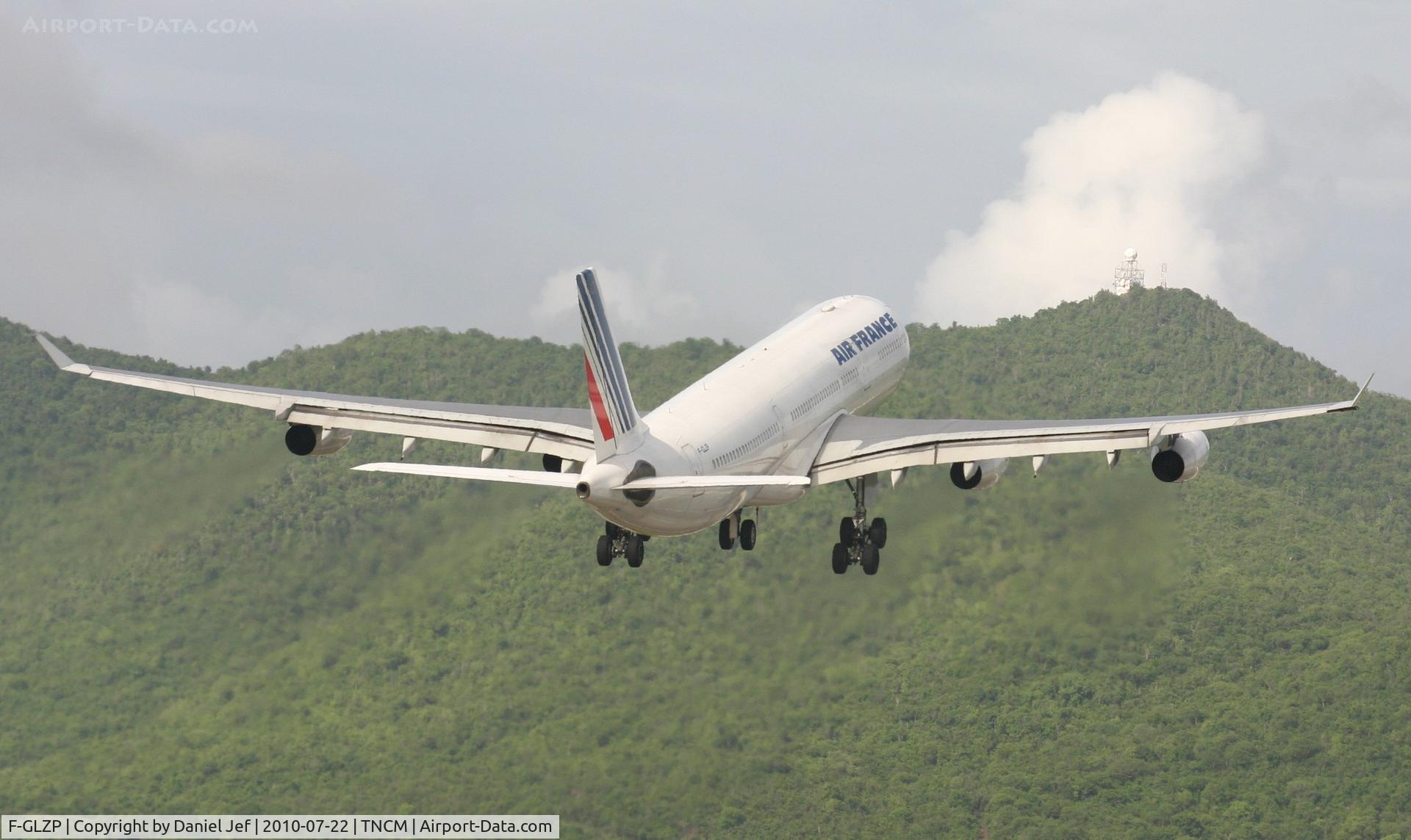 F-GLZP, 1999 Airbus A340-313X C/N 260, Air France F-GLZP clearing the hills for France