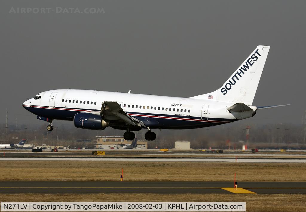 N271LV, 1998 Boeing 737-705 C/N 29090, Southwest touching down on 27R.