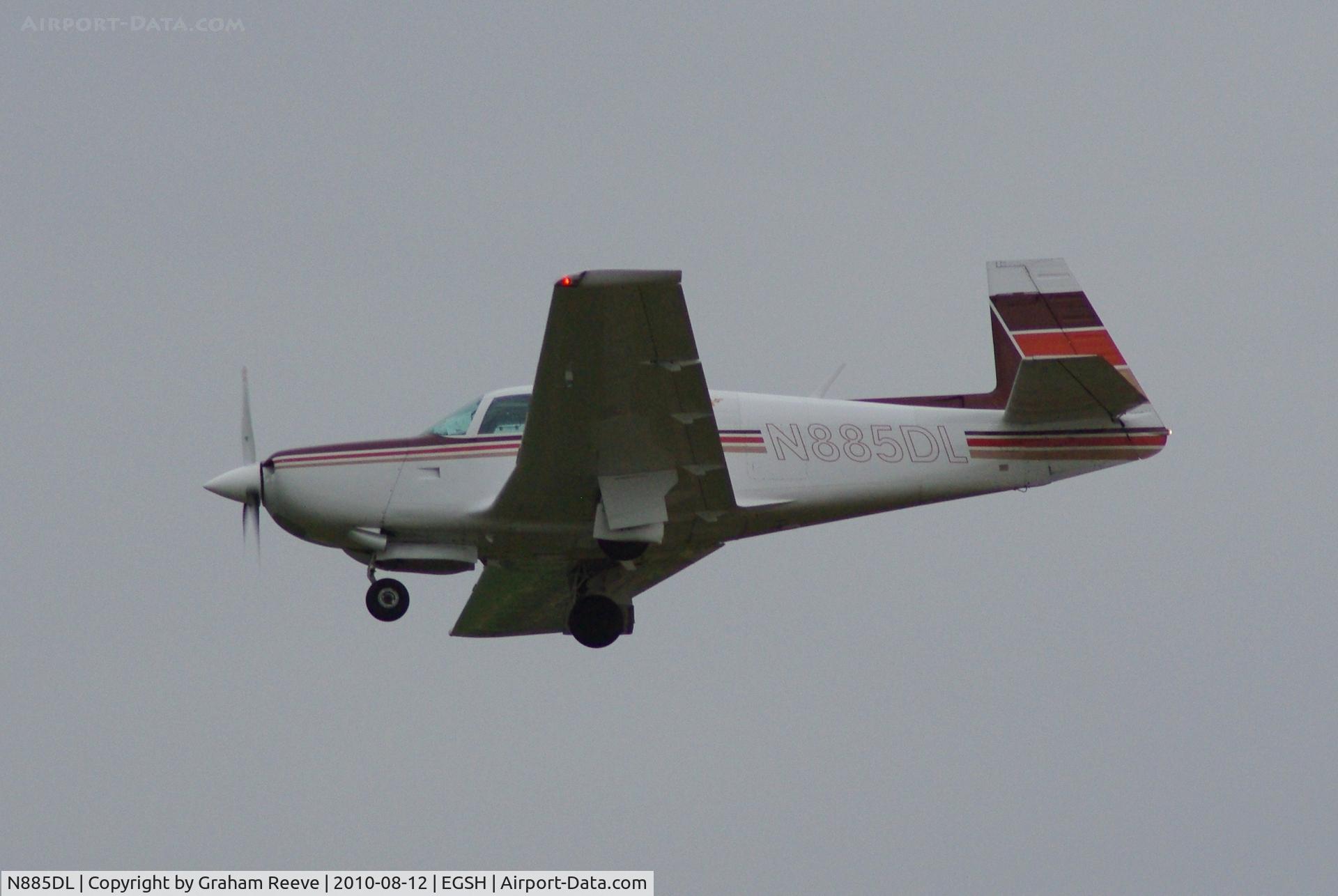 N885DL, 1980 Mooney M20K C/N 250479, Landing at Norwich.