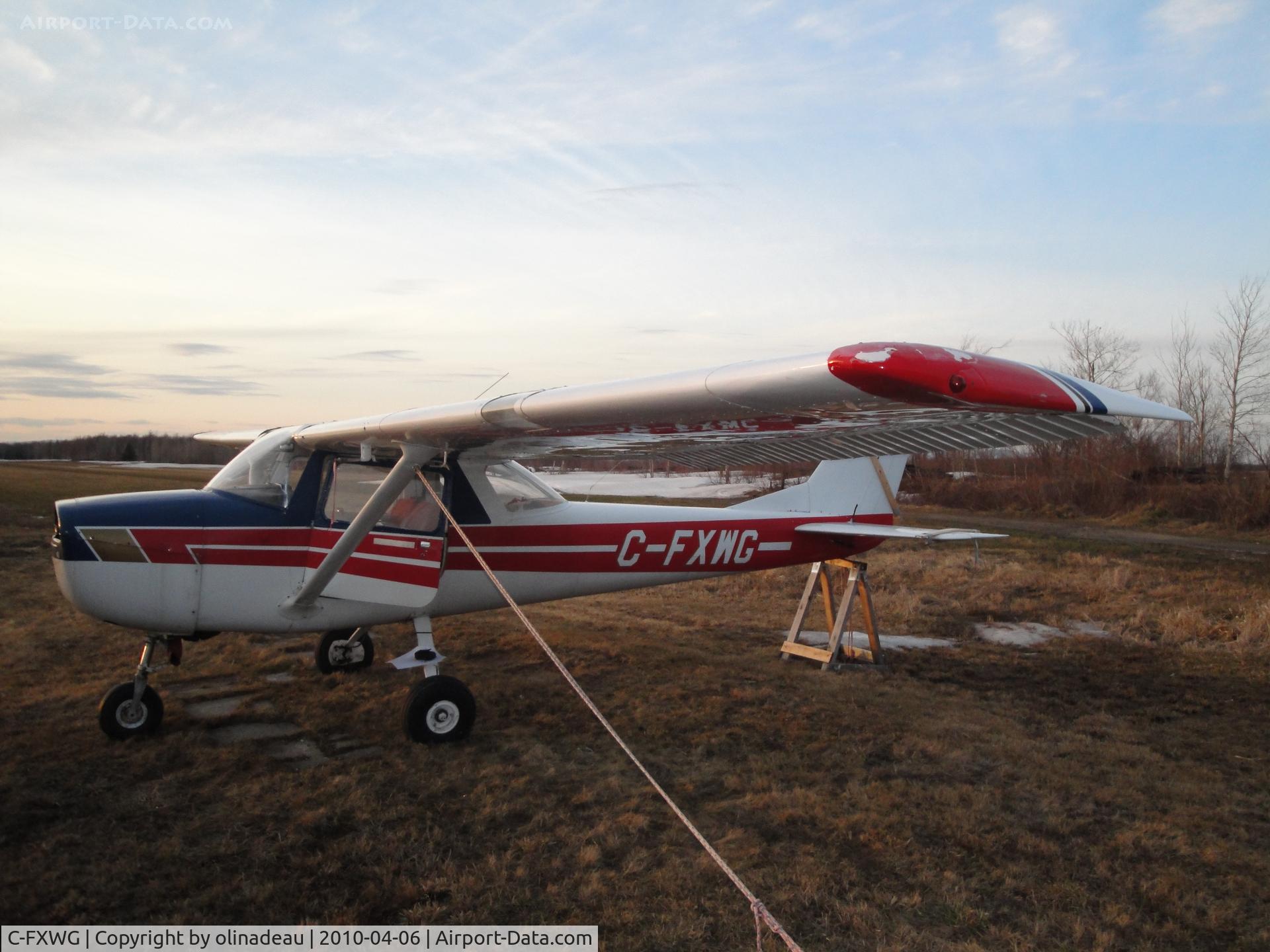 C-FXWG, 1968 Cessna 150J C/N 15069334, Parked, engine less, in a field at Pintendre near Québec City.
