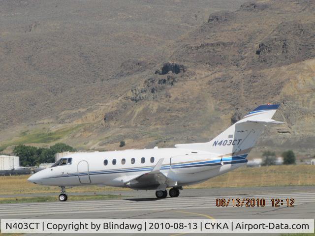 N403CT, 2006 Raytheon Hawker 850XP C/N 258818, ...rolling on 26...
