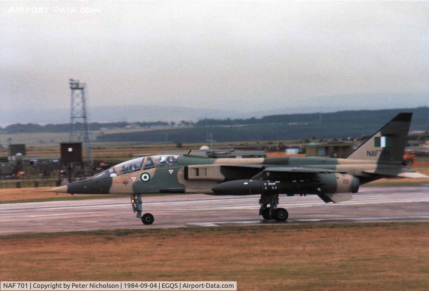 NAF 701, Sepecat Jaguar BN C/N B(N).02, Jaguar BN of the Nigerian Air Force taxying to the active runway at RAF Lossiemouth in September 1984.