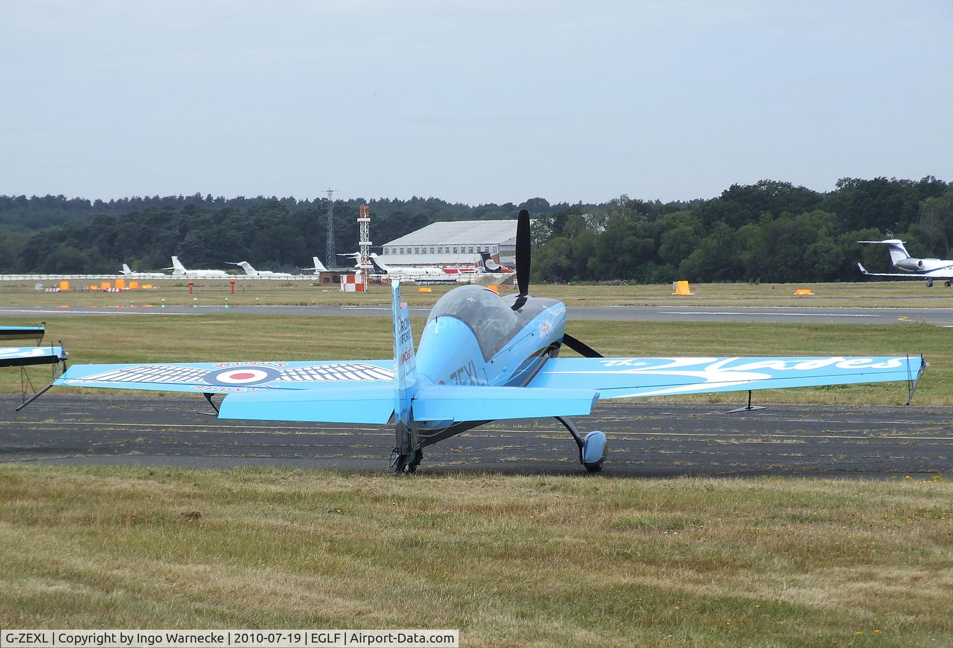 G-ZEXL, 2006 Extra EA-300L C/N 1225, Extra EA-300L of the Selex Galileo 'Blades' flying for the RAFA at Farnborough International 2010