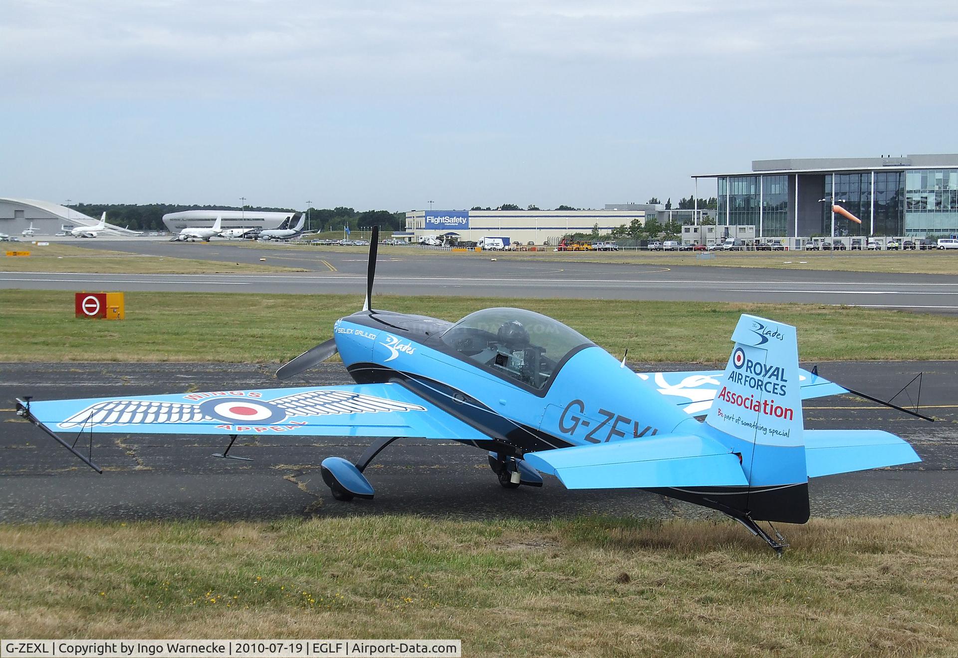 G-ZEXL, 2006 Extra EA-300L C/N 1225, Extra EA-300L of the Selex Galileo 'Blades' flying for the RAFA at Farnborough International 2010