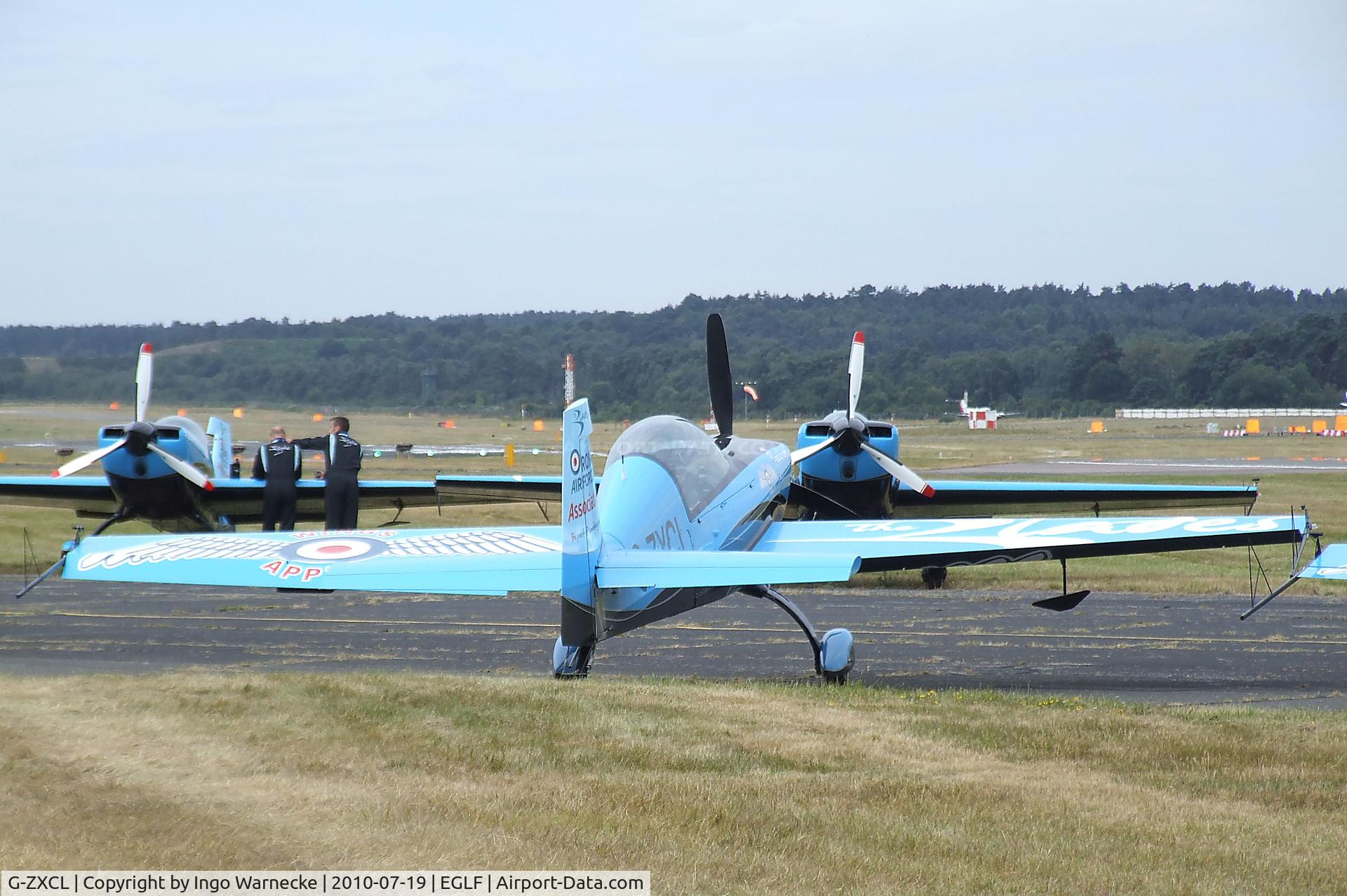 G-ZXCL, 2006 Extra EA-300L C/N 1223, Extra EA-300L of the Selex Galileo 'Blades' flying for the RAFA at Farnborough International 2010