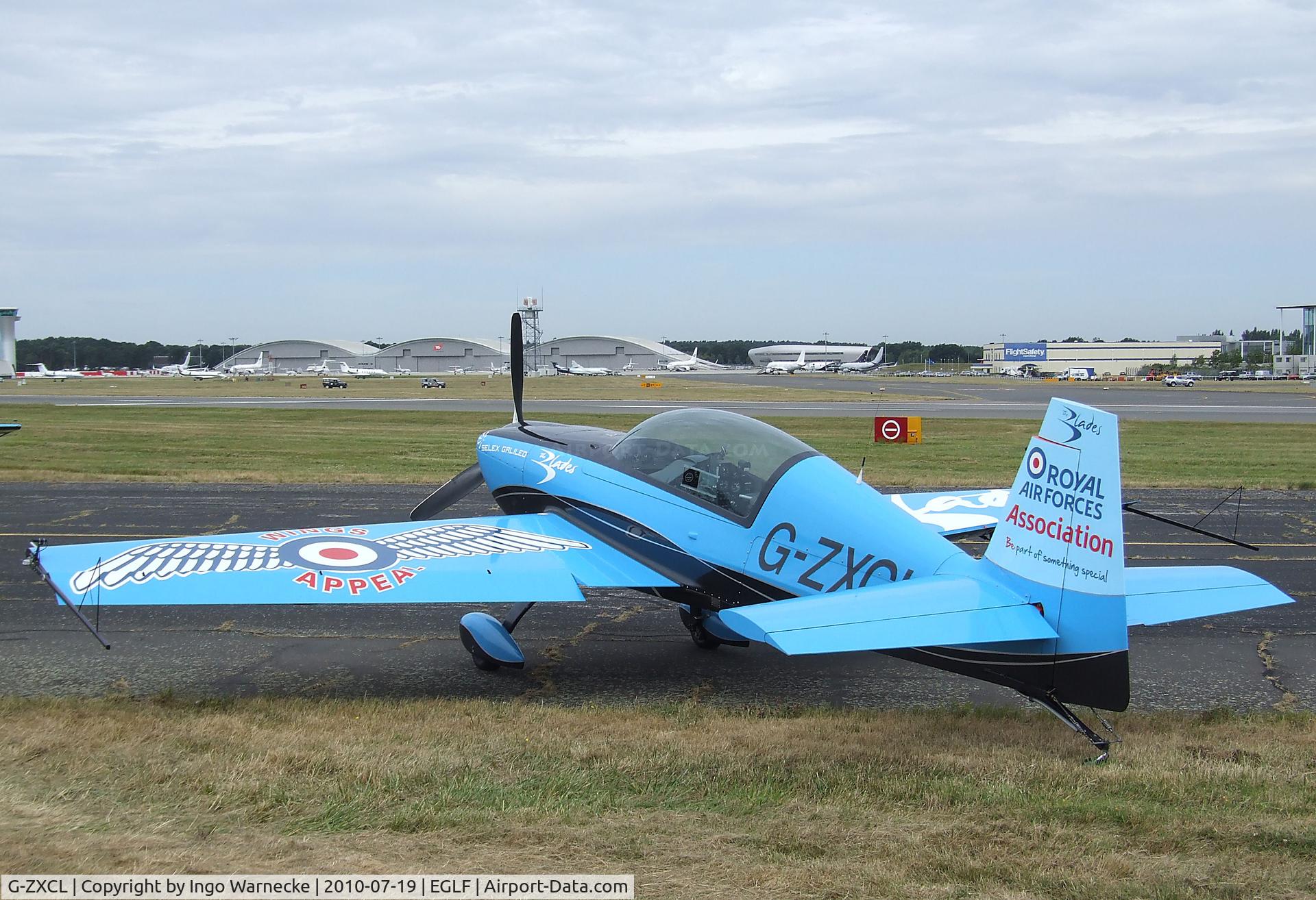 G-ZXCL, 2006 Extra EA-300L C/N 1223, Extra EA-300L of the Selex Galileo 'Blades' flying for the RAFA at Farnborough International 2010