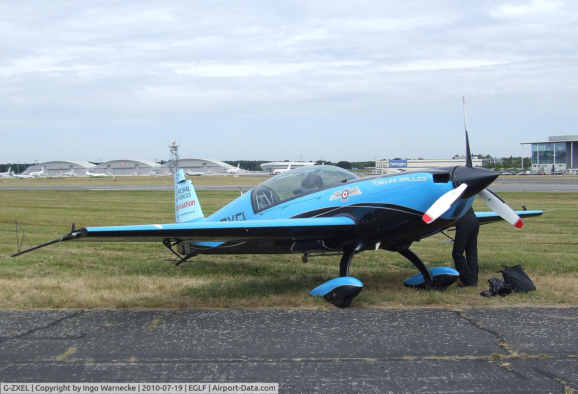 G-ZXEL, 2006 Extra EA-300L C/N 1224, Extra EA-300L of the Selex Galileo 'Blades' flying for the RAFA at Farnborough International 2010